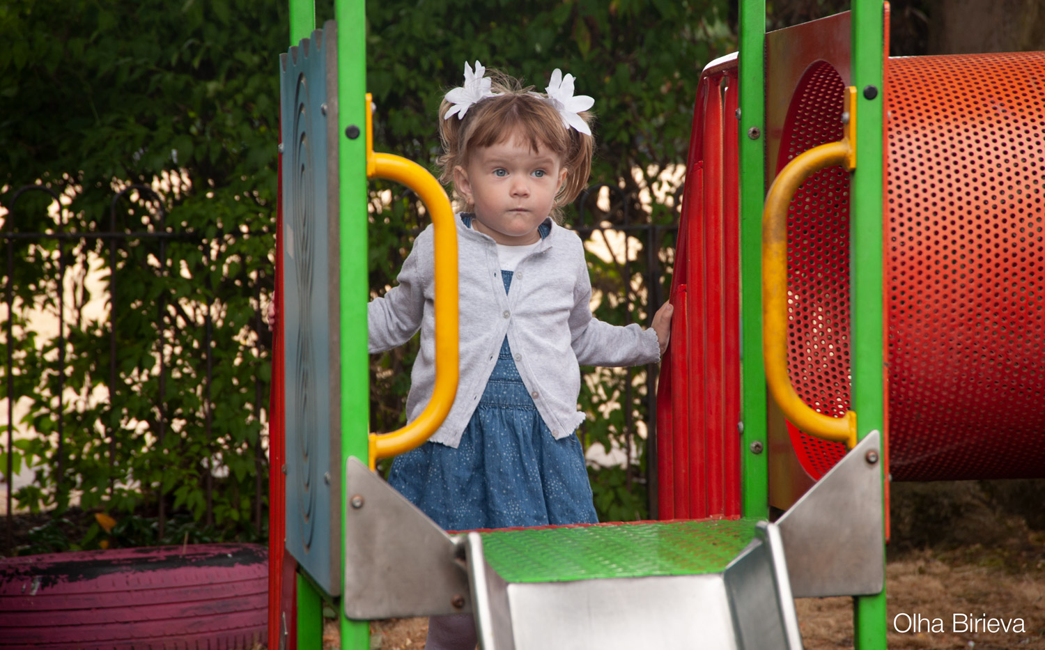 Little girl on the slide