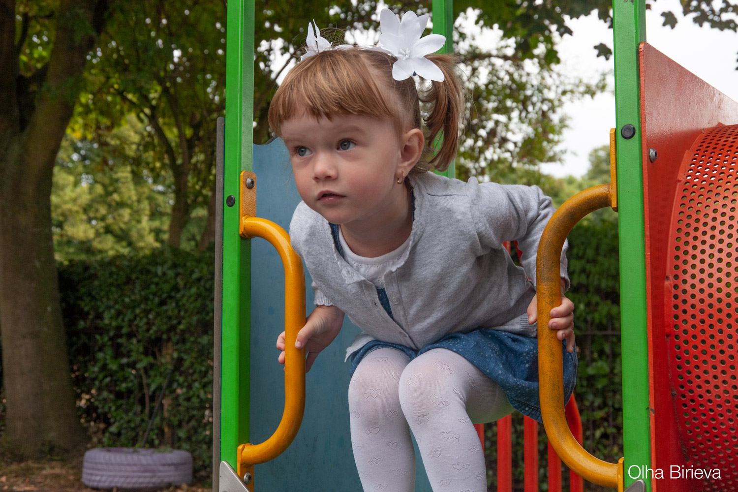 Little girl on the slide